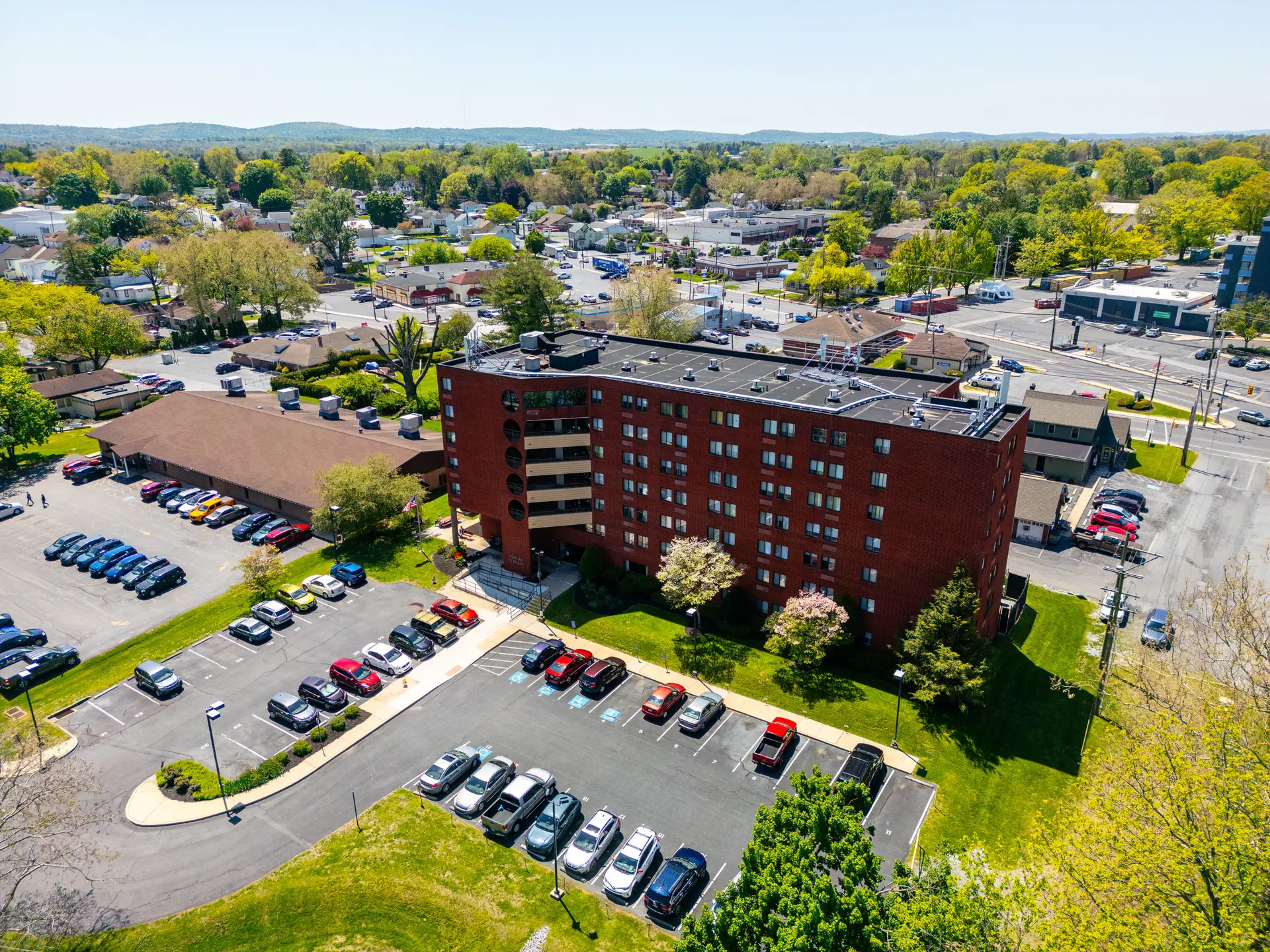 Aerial view of a multi-storey senior living apartment building
